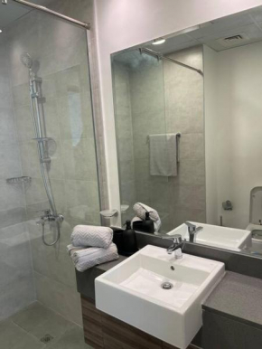 Appartement neuf et moderne - accès piscine et gym